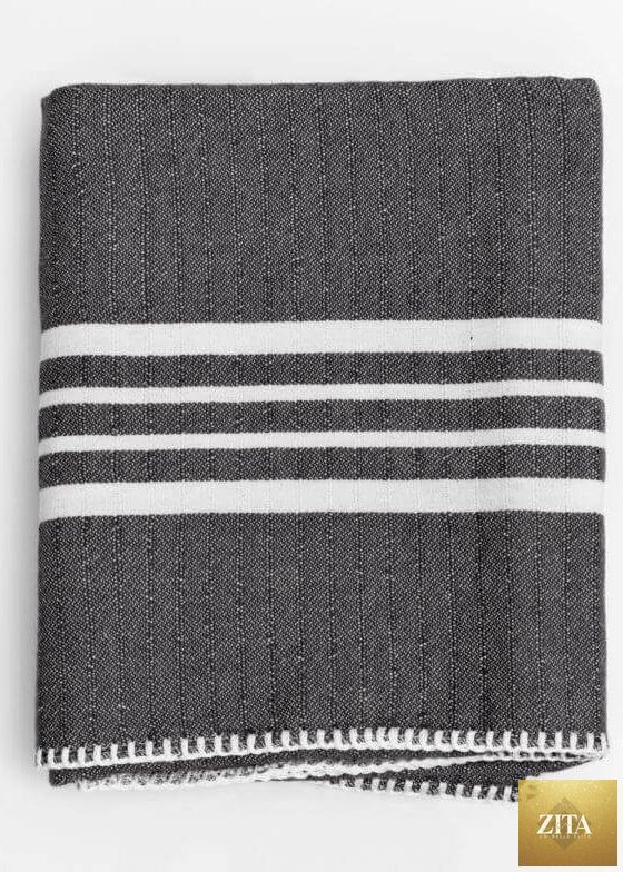 Black Farm House Turkish Towel without fringe from Zita La Belle Elite, showcasing soft, woven fabric and simple design.