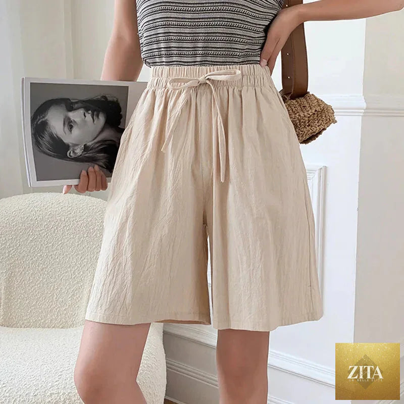 Loose summer cotton linen women's shorts with elastic waist and wide-leg design, casual and straight-fit for a relaxed style.