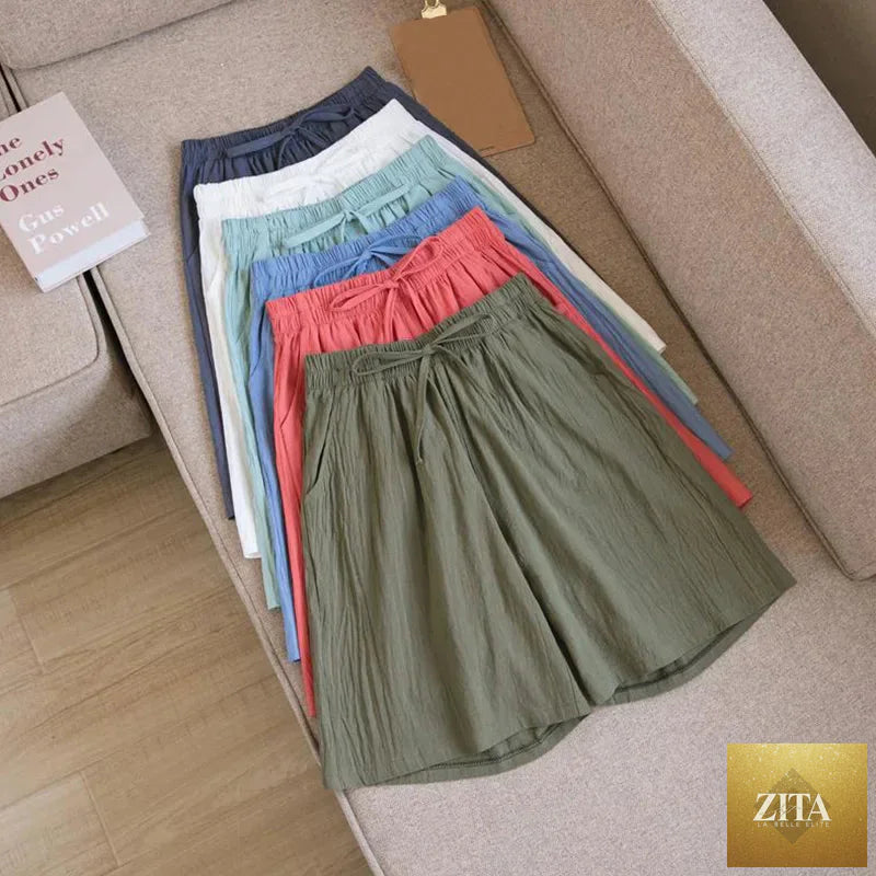 Summer cotton linen loose women's shorts with elastic waist, wide-leg, casual straight fit, ideal for warm weather and relaxed style.