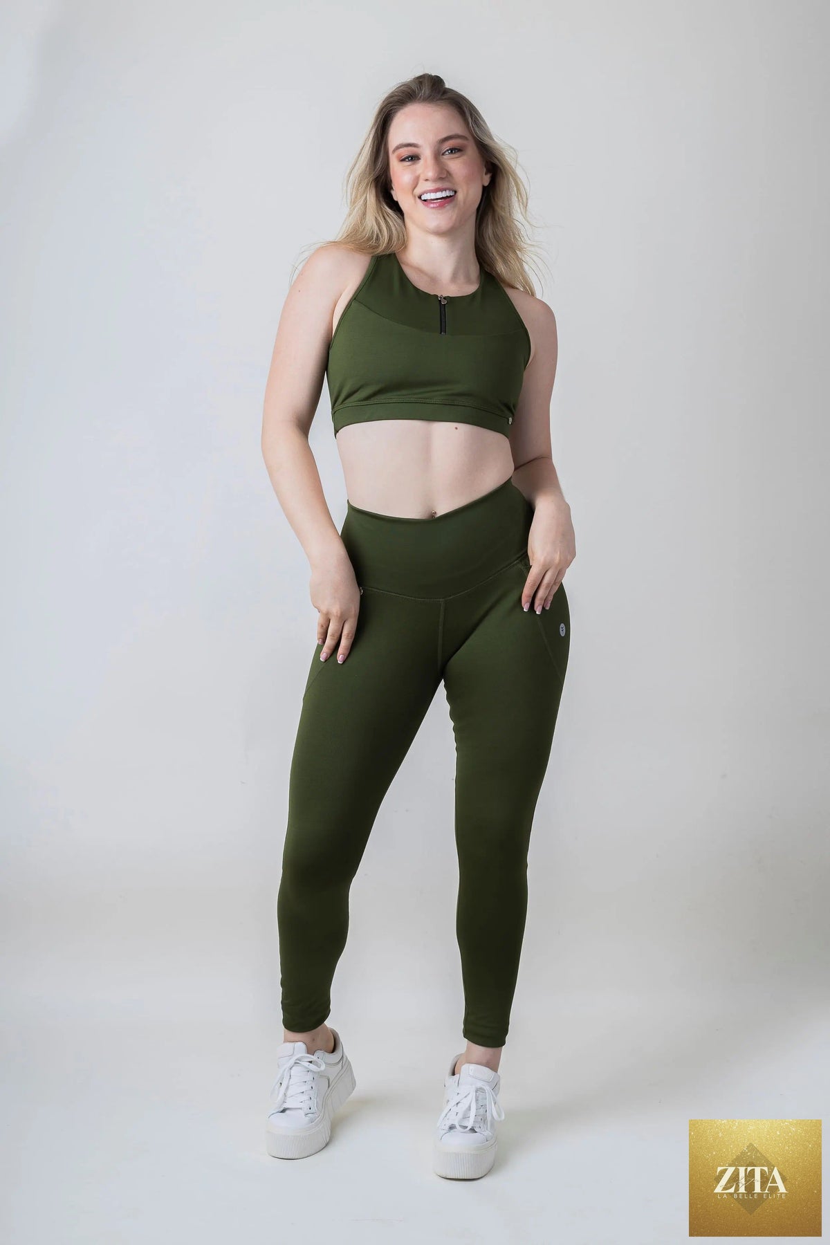 TangoFit timeless yoga leggings in black, high-waisted with a comfortable fit and subtle branding, suitable for active wear.