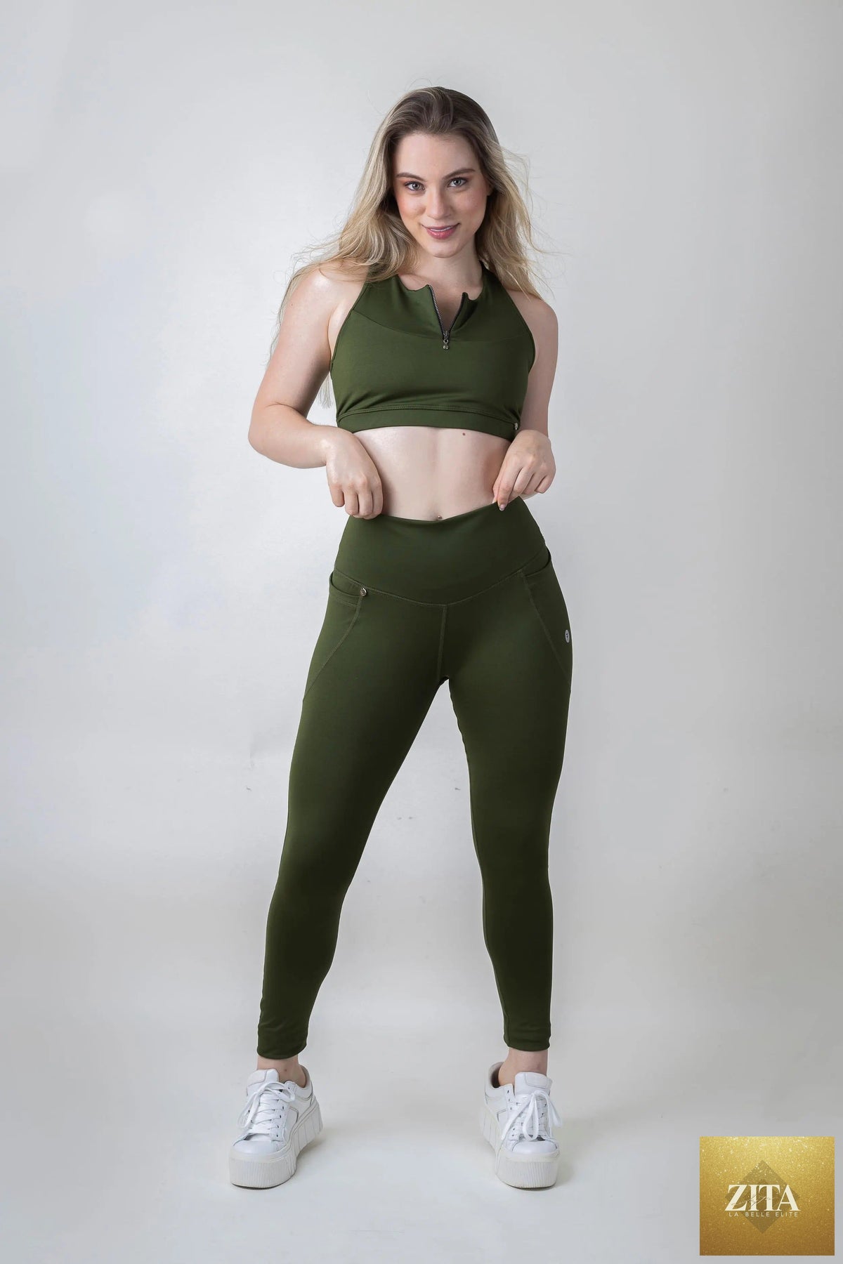 TangoFit timeless yoga leggings in black, high-waisted with stretch fabric, shown on a model for comfortable activewear.