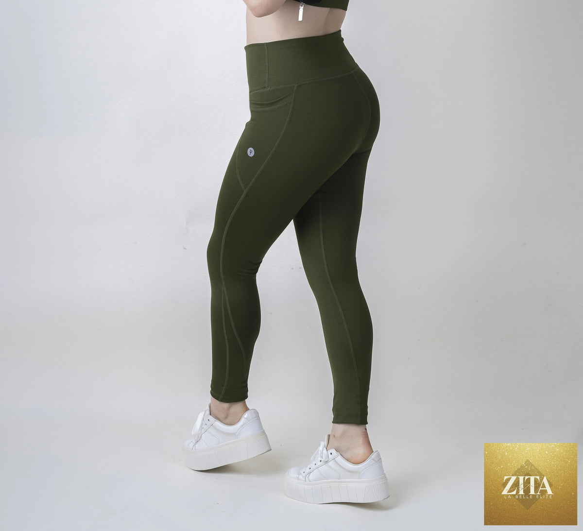 TangoFit timeless yoga leggings in black, form-fitting with a high waistband, suitable for workout and yoga sessions.