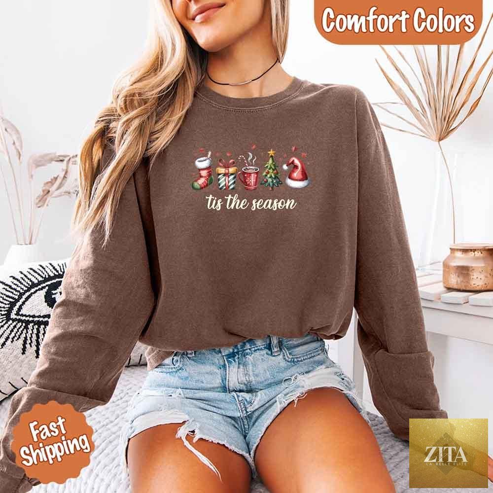 Comfort Colors long sleeve Christmas shirt with "Tis The Season" design, perfect for holiday wear by Adorb Custom Tees.