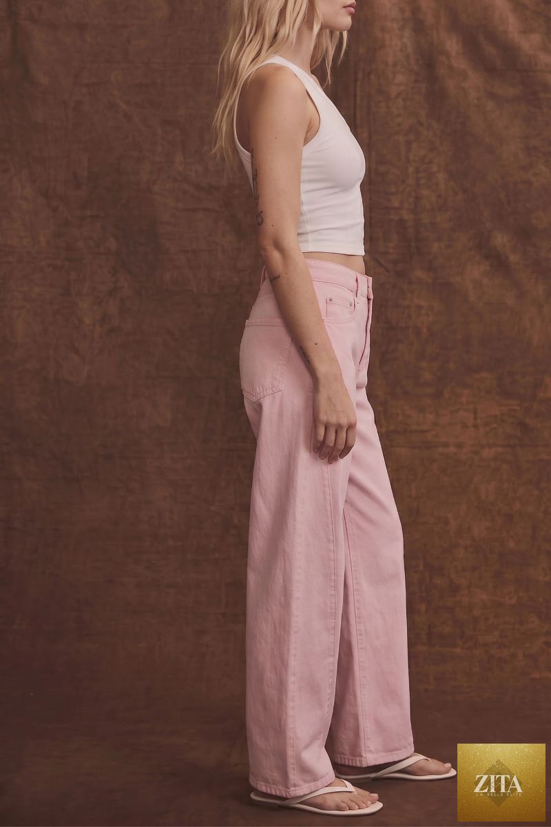 Pink high rise barrel leg jeans by Artemis Vintage, featuring a classic denim look and stylish fit.