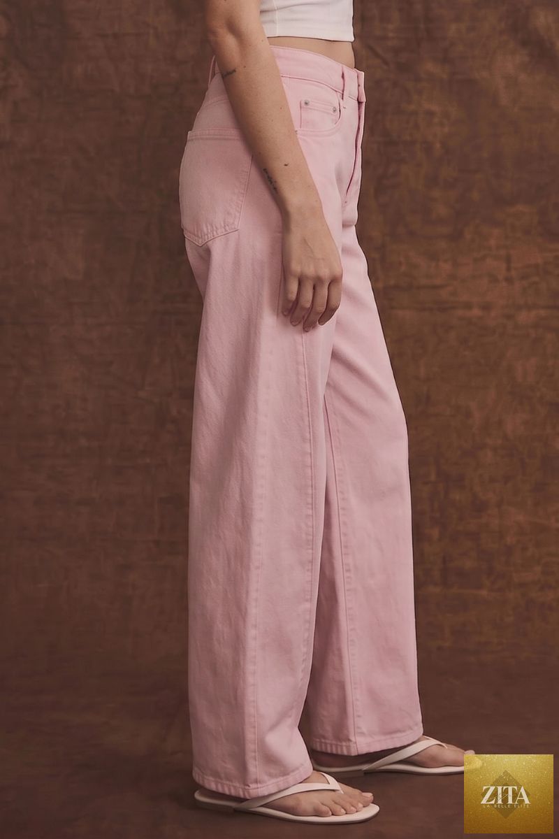 Pink high-rise barrel leg jeans by Artemis Vintage, showcasing a stylish fit and classic denim texture.