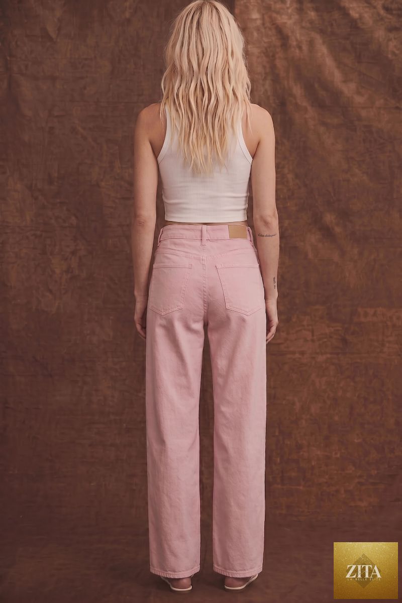 Pink high-rise barrel leg jeans by Artemis Vintage, showing the fit and style on a model against a neutral background.