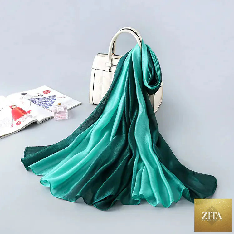 Elegant gradient silk scarf for women offering sun protection, featuring soft fabric and stylish design.