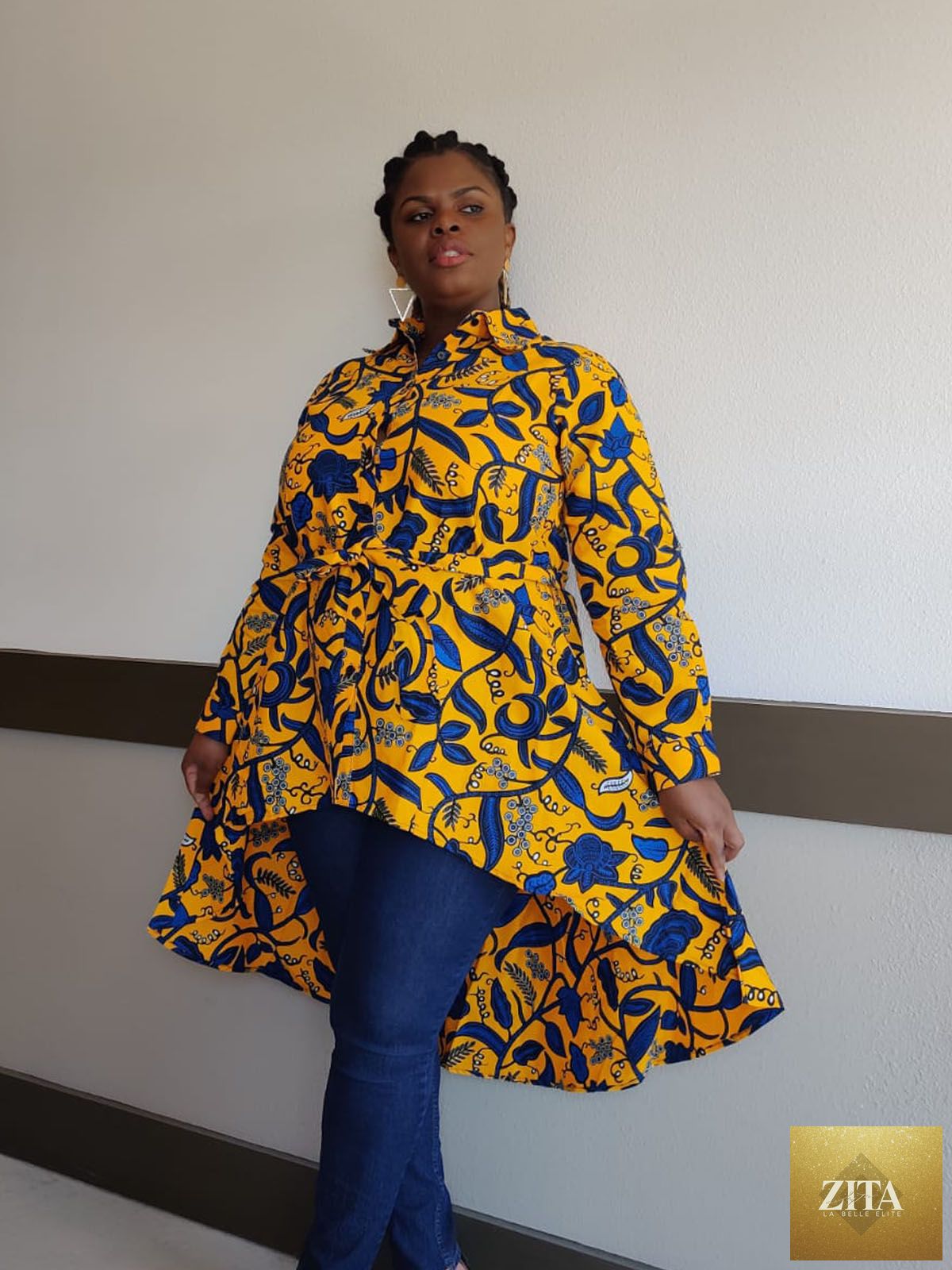 Blue and yellow Kente African print high-low button-up shirt from Duma Mbili LLC, featuring vibrant traditional pattern and stylish design.