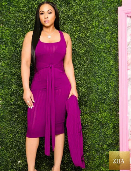 Elegant halter maxi dress for women featuring flowing fabric and a fitted waist, stylishly designed by Trendy Attic Store01.