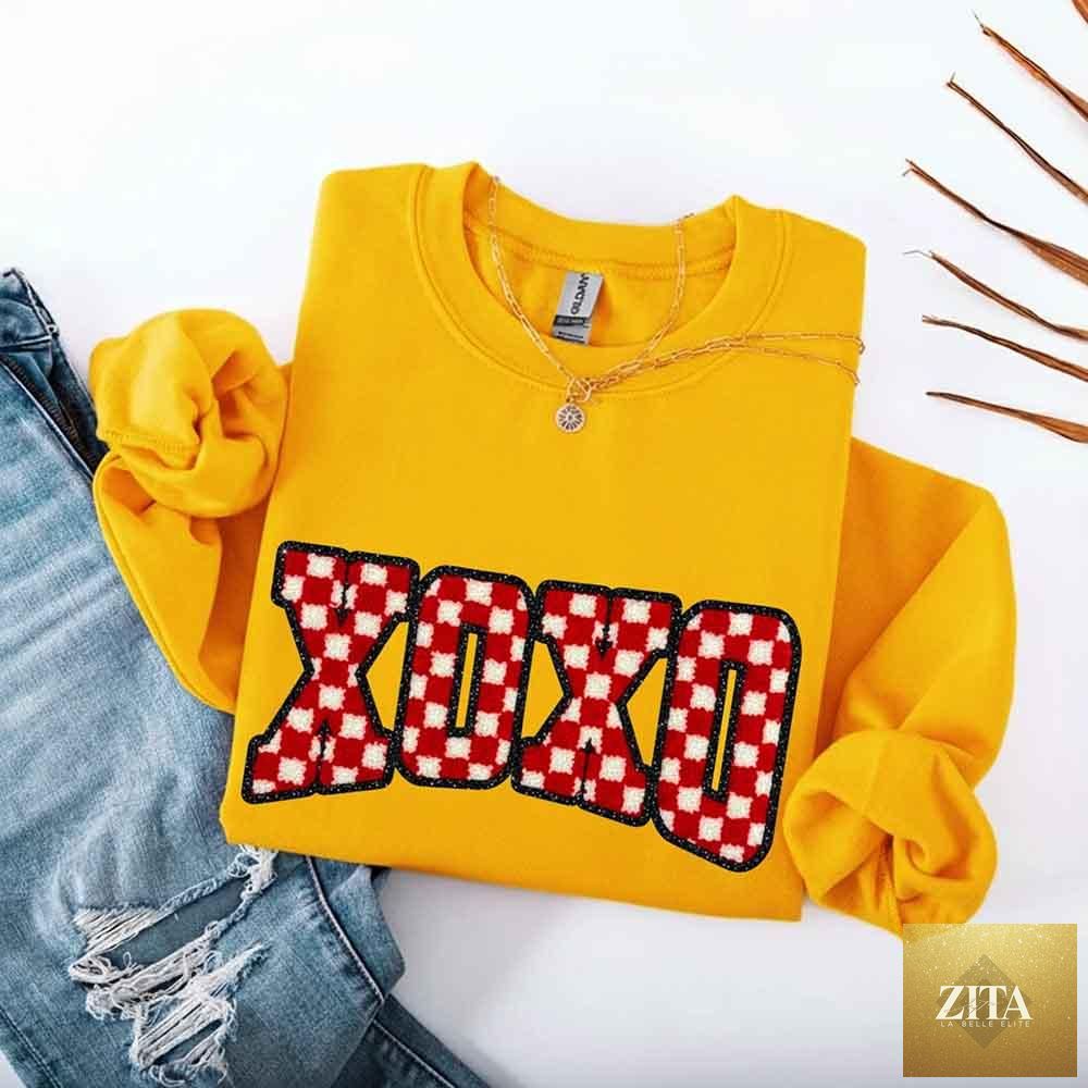 Furry checkered XOXO Valentine sweatshirt by Adorb Custom Tees featuring printed heart and checker pattern on a cozy sweater.