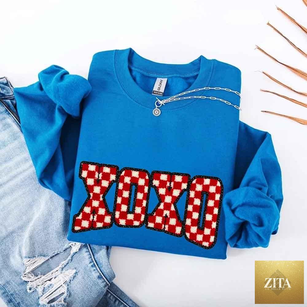 Adorb Custom Tees XOXO checkered Valentine sweatshirt with furry printed design, cozy and stylish sweater for Valentine's Day.
