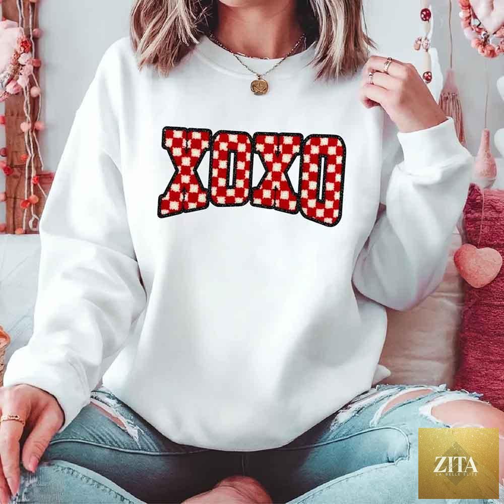 Furry pink and red checkered Valentine sweatshirt by Adorb Custom Tees with XOXO print and cozy design.