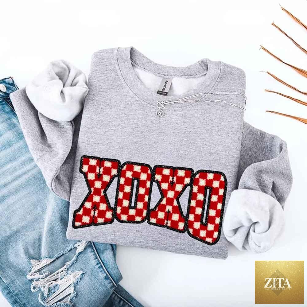 Furry checkered Valentine sweatshirt with XOXO print from Adorb Custom Tees, featuring a cozy, printed sweater design.