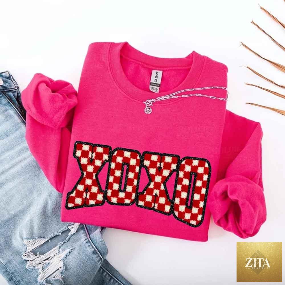 Furry checkered Valentine sweatshirt with XOXO print from Adorb Custom Tees, featuring a cozy, printed sweater design.