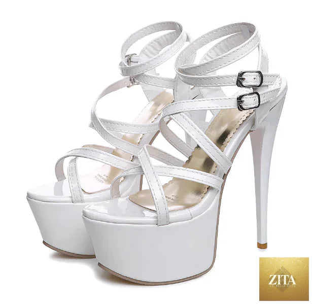 Elegant women’s strappy high heels with stiletto design from Trendy Attic Store01, featuring sleek straps and a tall, stylish heel.