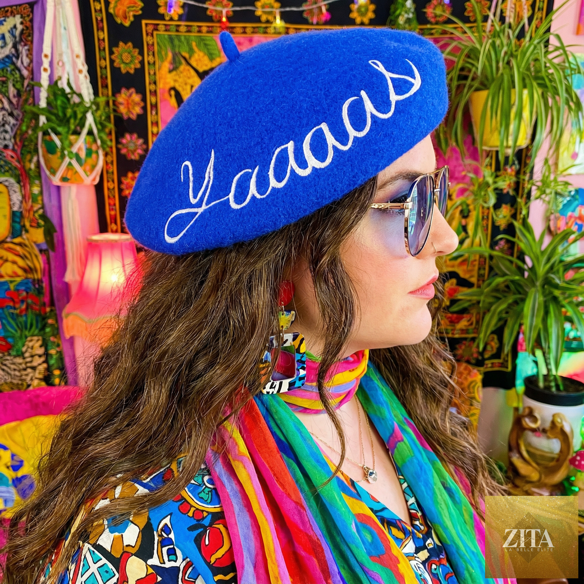 Blue embroidered beret hat with "Yaaaas" text, stylish accessory from The Bullish Store.