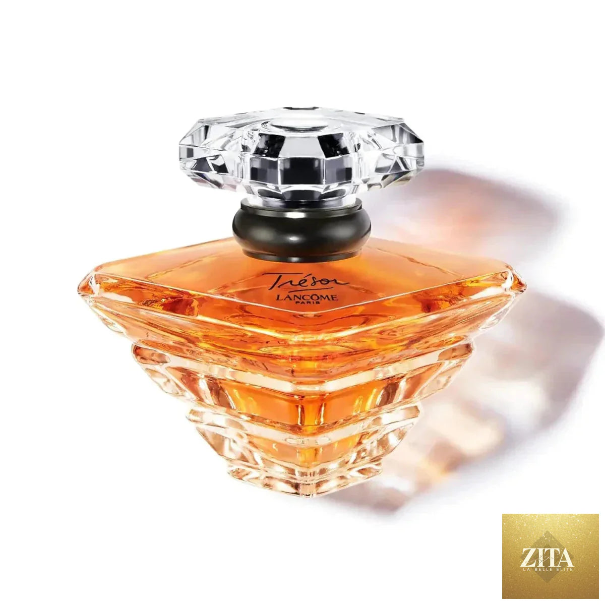 Lancôme Trésor Eau de Parfum bottle with floral notes of rose, lilac, peach, and apricot blossom, elegant romantic women’s perfume.