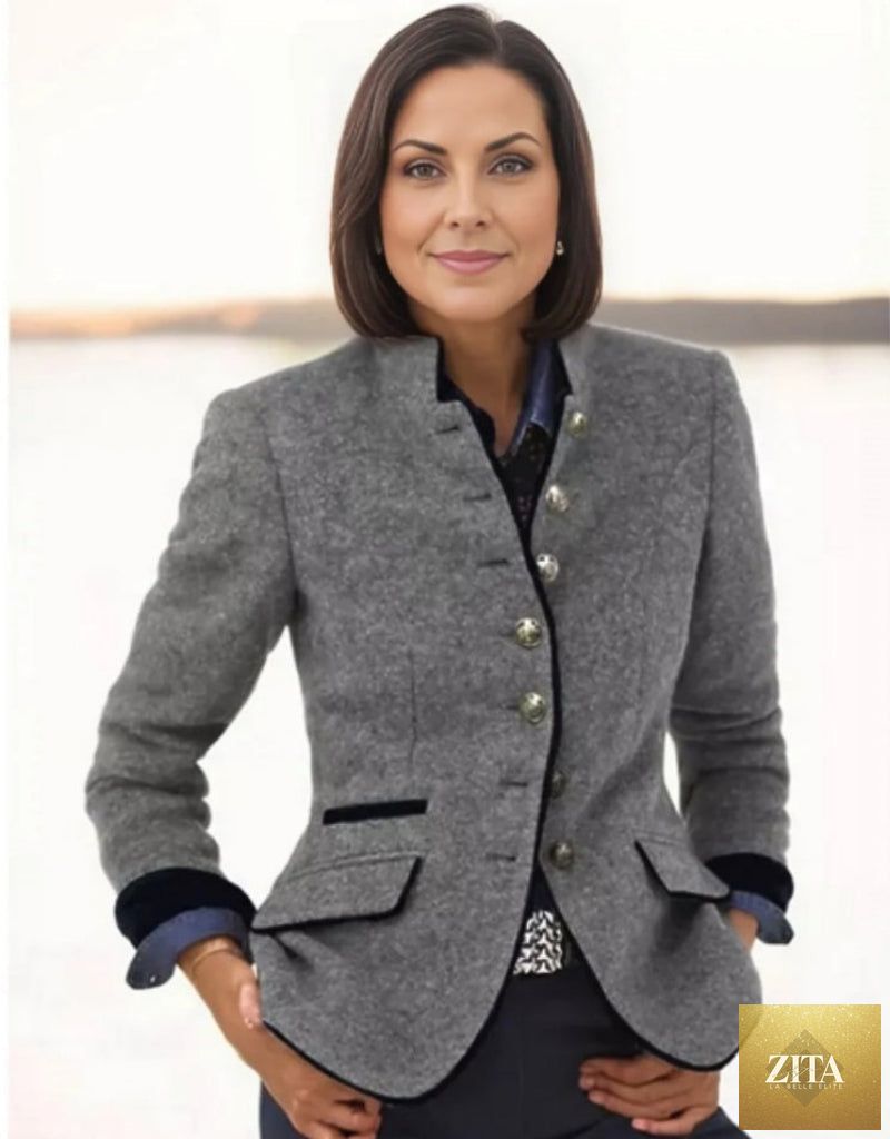 Women’s color-block woolen coat by FitiqueFit featuring multi-buttons, casual yet elegant design, shown in a close-up image.