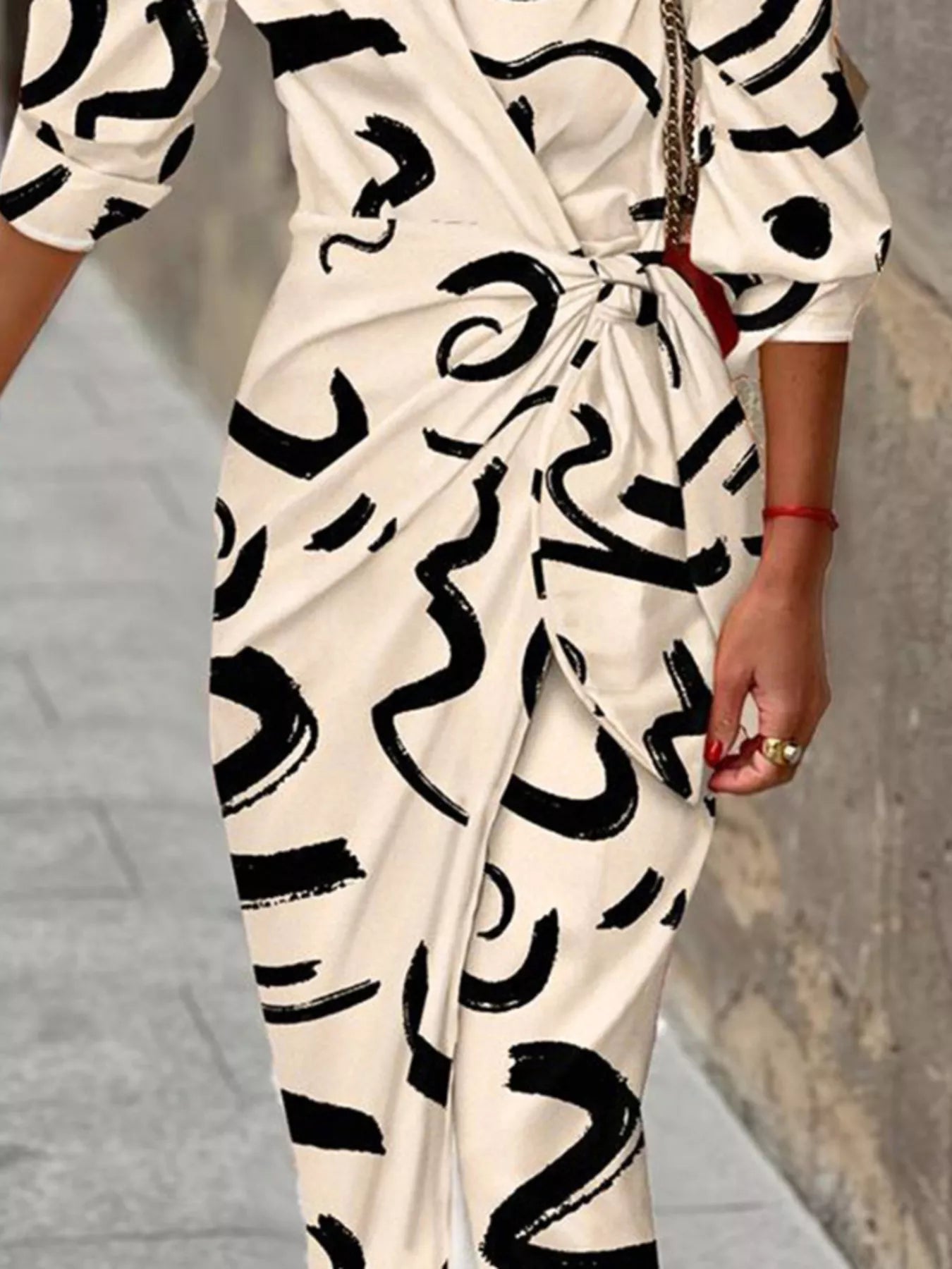Printed collared neck shirt dress from Shopiebay featuring a button-down front, long sleeves, and a stylish, casual design.