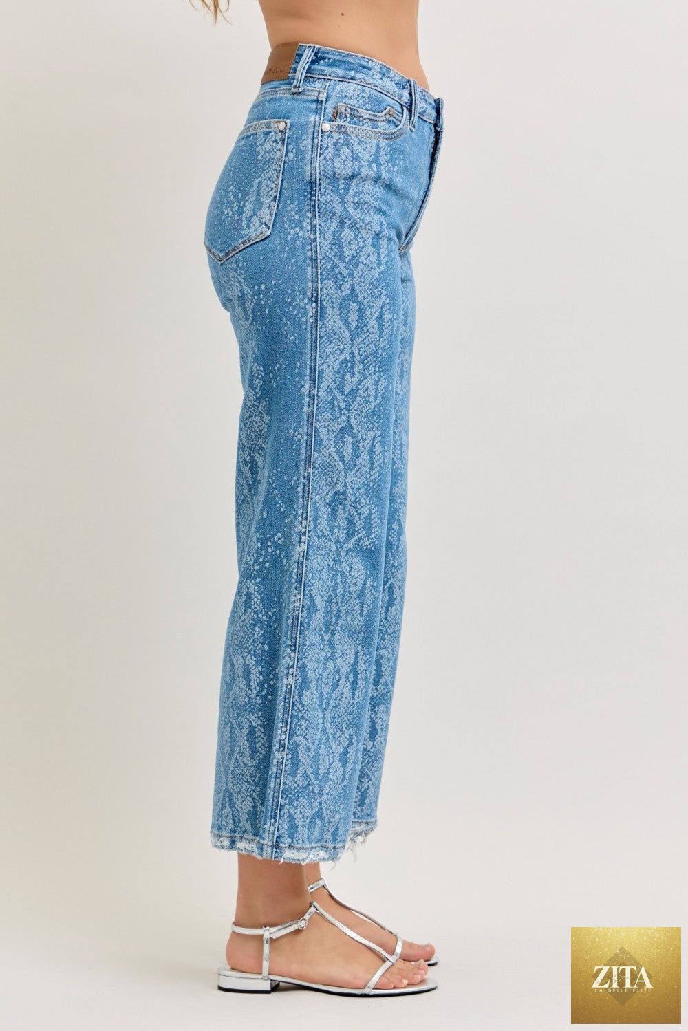 Wild and Free Boutique Judy Blue high rise ankle wide leg jeans displayed on a model, showcasing their stylish fit and denim fabric.