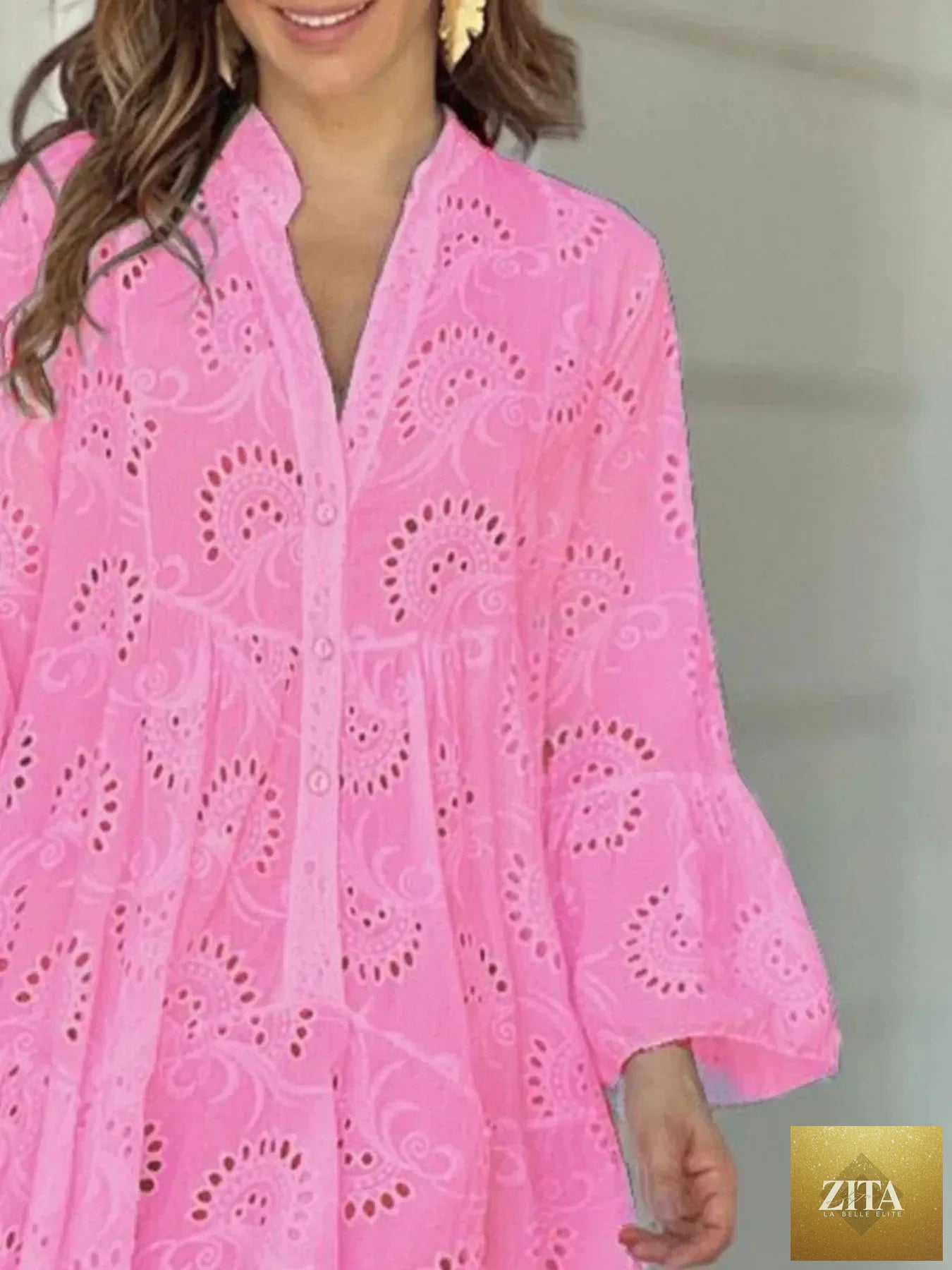 Eyelet ruffled hem tiered dress by Shopiebay featuring a feminine design with layered fabric and eyelet details.