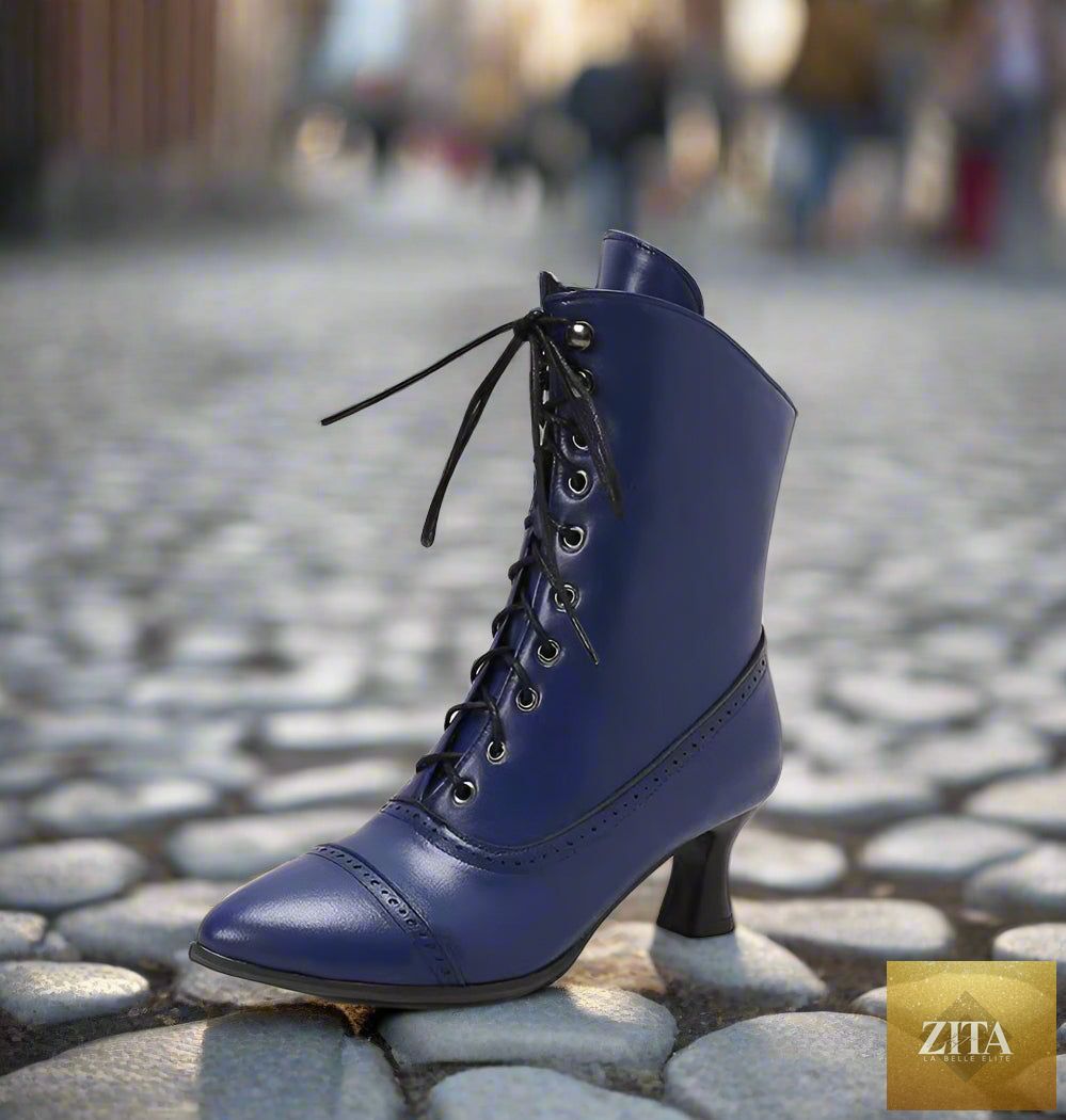 Women’s high heel Martin boots by Zita La Belle Elite featuring British motorcycle fashion style, black leather footwear with chunky heels.