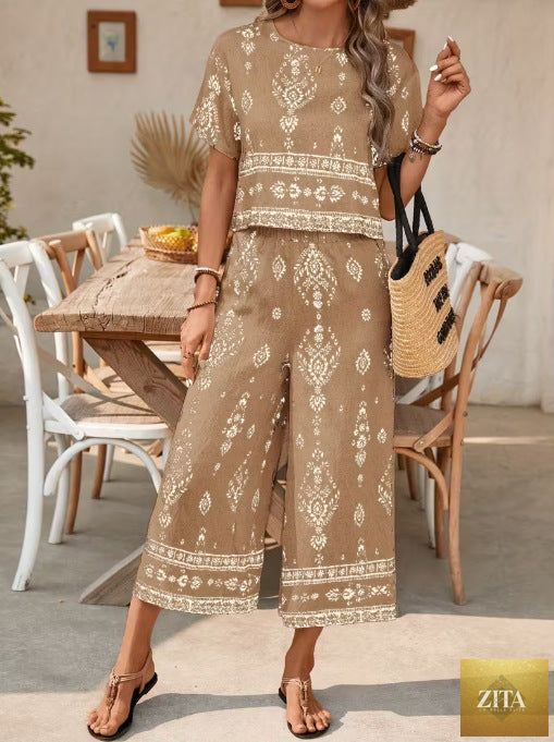 Women's ethnic print two-piece casualwear set with a top and straight-leg pants by Zita La Belle Elite, featuring vibrant contrast patterns.
