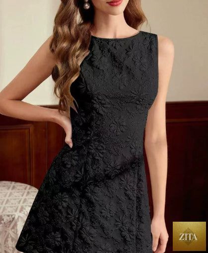 Women's Zita La Belle Elite sleeveless jacquard midi dress with slim fit, minimalist French style, shown on a model.