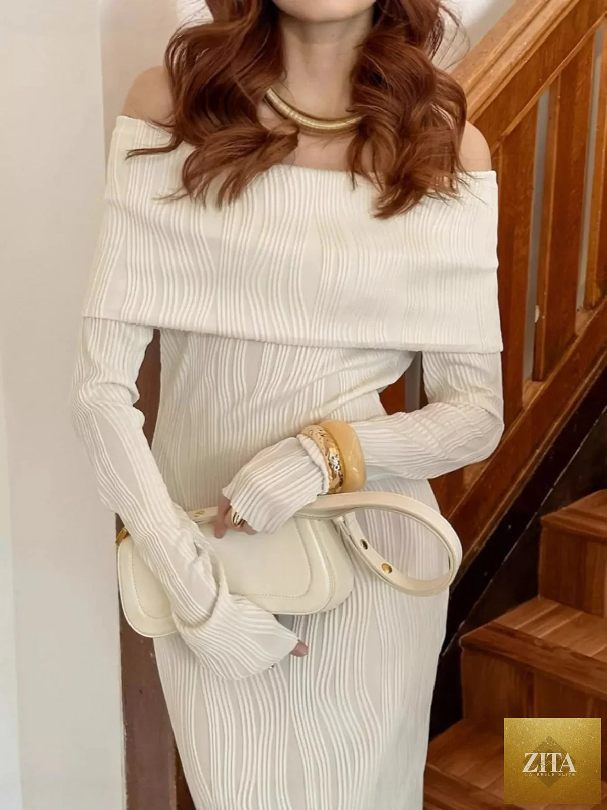 Off-shoulder textured knit maxi dress from Shopiebay, featuring a flowing silhouette and stylish design.