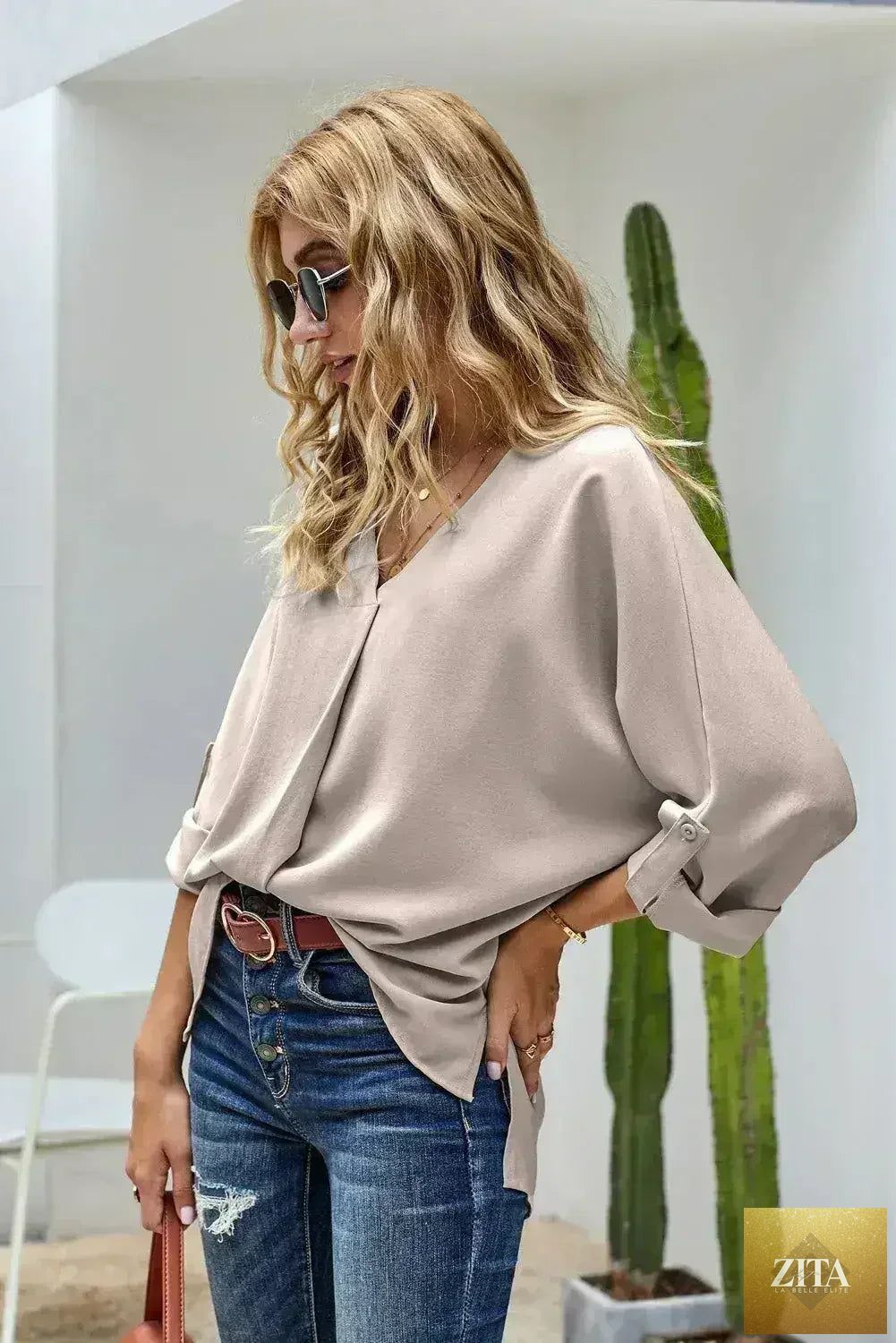 Femstylo elegant apricot V-neck blouse with 3/4 sleeves and high-low hem, stylish top for casual or dressy occasions.