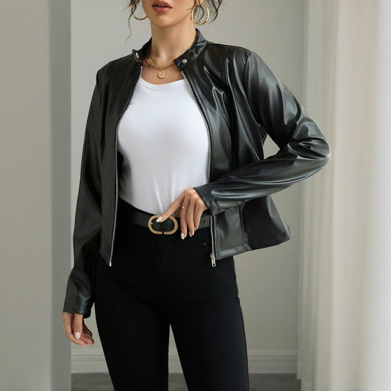 Women's solid color long sleeve faux leather blazer with stand collar, casualwear by FitiqueFit, shown on a model.