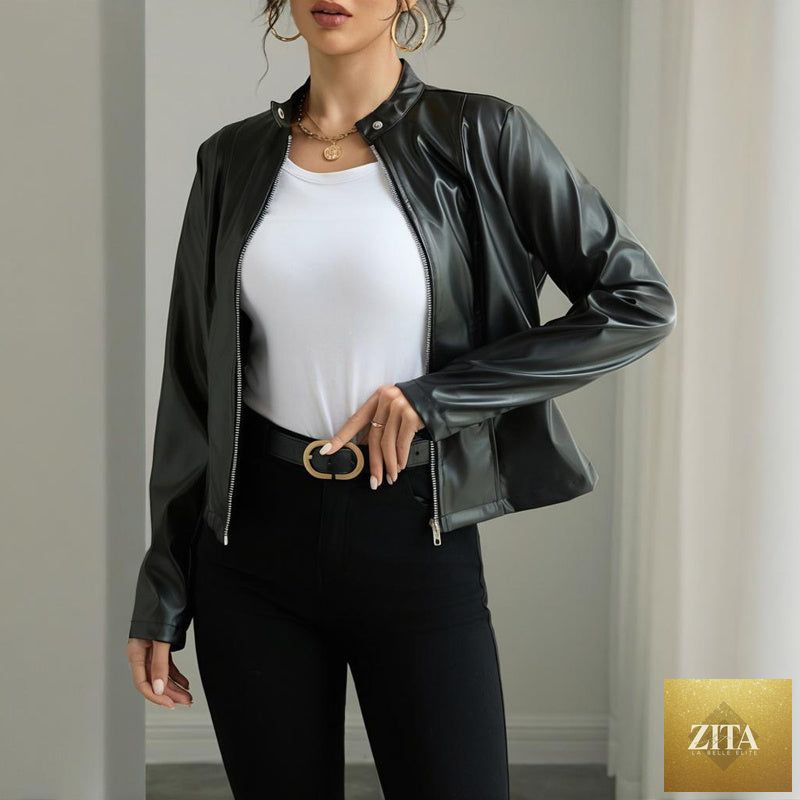 Women's solid color long sleeve faux leather blazer with stand collar, casualwear by FitiqueFit, shown on a model.