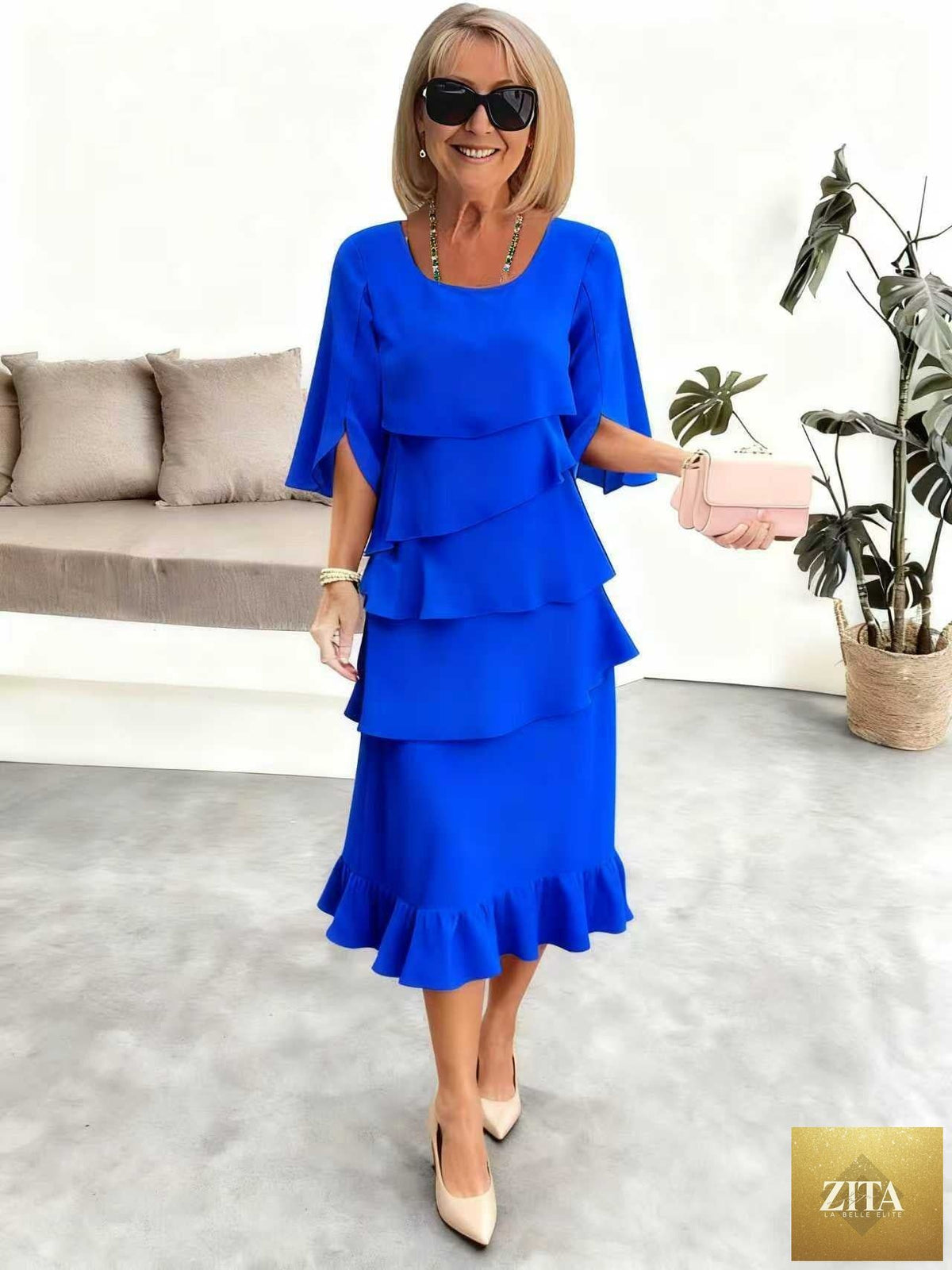 Patchwork Cake Midi Dress by FitiqueFit featuring a round neck, short sleeves, and a tiered skirt with patchwork design.