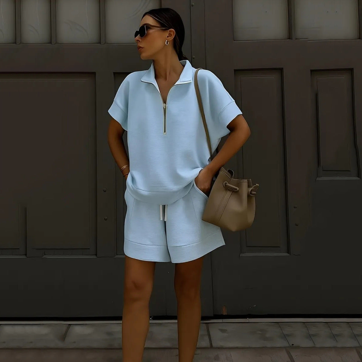 Women's solid color casual sweatshirt set by FitiqueFit, featuring a short top and matching pants in a relaxed fit.