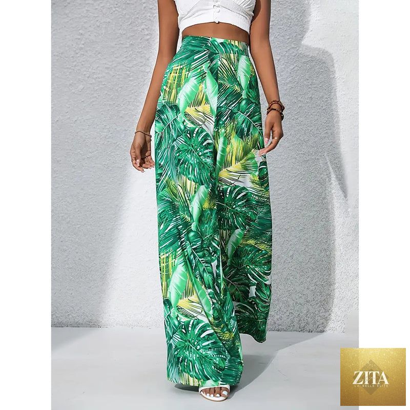 Women’s printed high-waist wide-leg palazzo pants by FitiqueFit, casualwear with colorful floral pattern and relaxed fit.