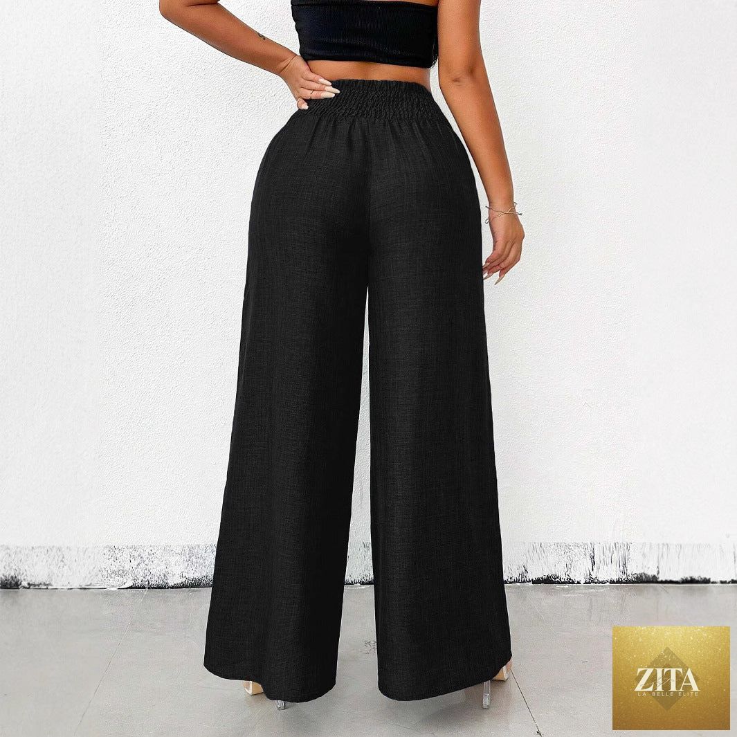 Women's high-waist drapey wide-leg casual pants by Zita La Belle Elite with elastic drawstring in five colors, shown on a model.