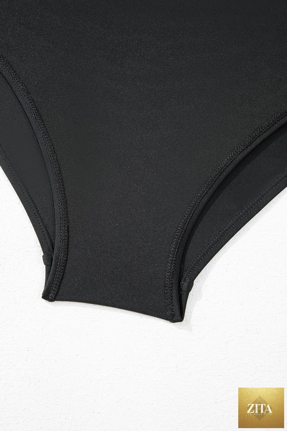 Black scallop trim drawstring beach shorts with elastic waistband and lightweight fabric, perfect for casual summer wear.