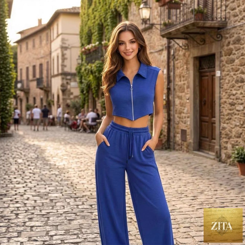 Women's sleeveless vest and wide-leg pants set by Zita La Belle Elite, casualwear, styled together with neutral tones.