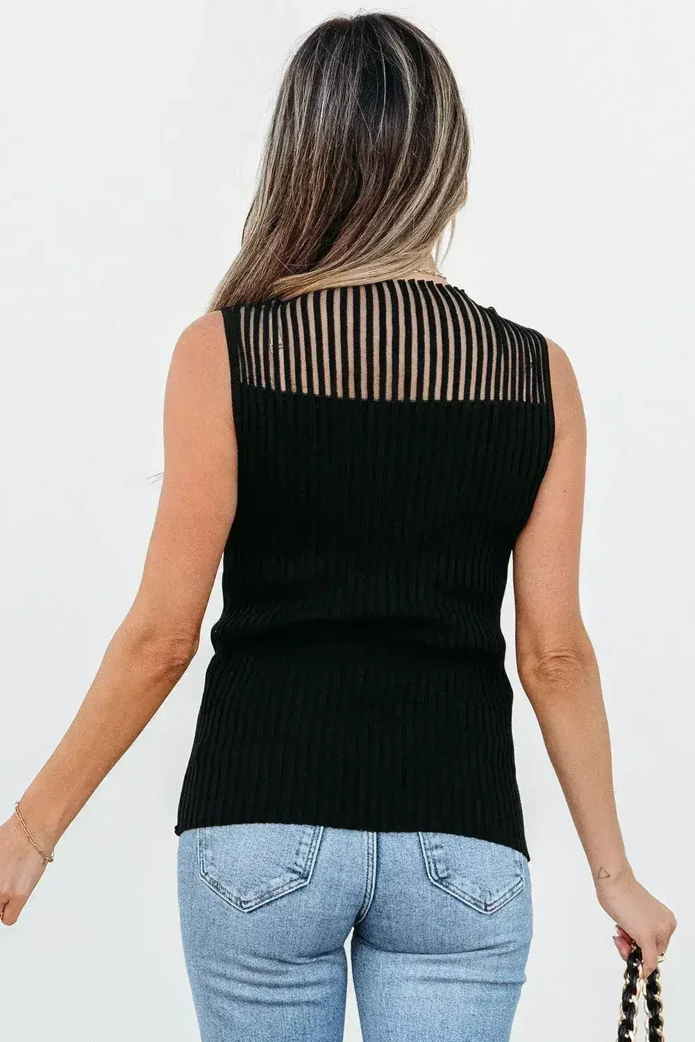 Black mesh cutout knit vest by Femstylo featuring an edgy ribbed design, perfect for stylish tops and blouses.
