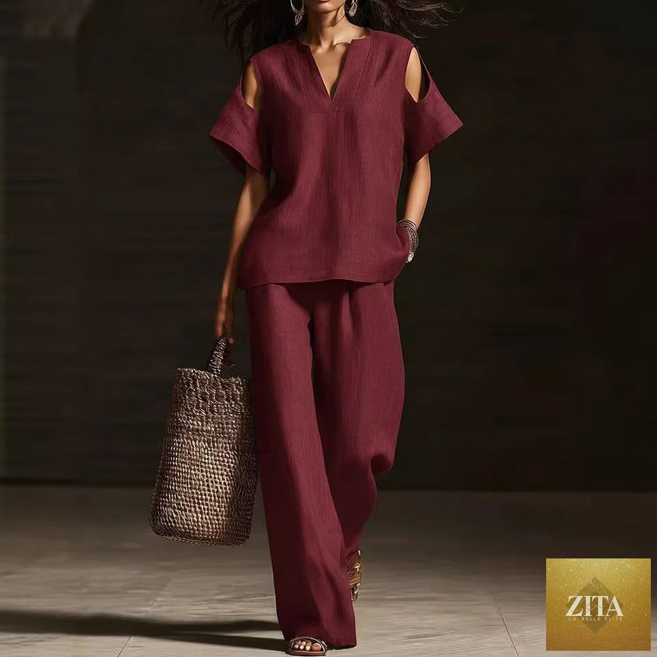 Zita La Belle Elite two-piece V-neck short sleeve top and straight-leg pants set with ripped detail and pockets in solid color