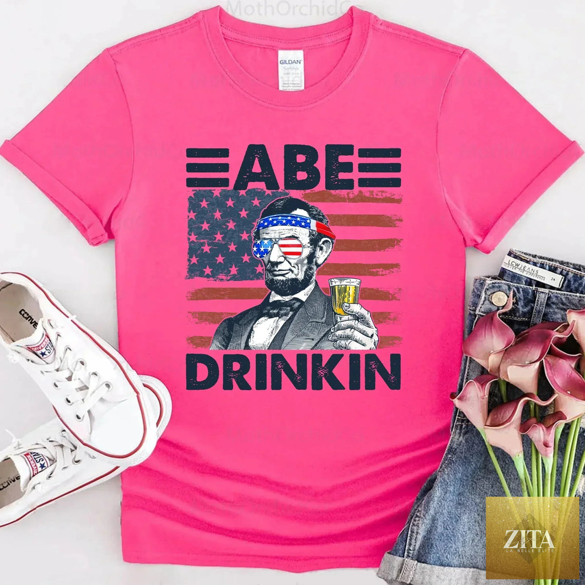 Red, white, and blue Abraham Lincoln patriotic T-shirt featuring a fun drinking design for 4th of July celebrations.