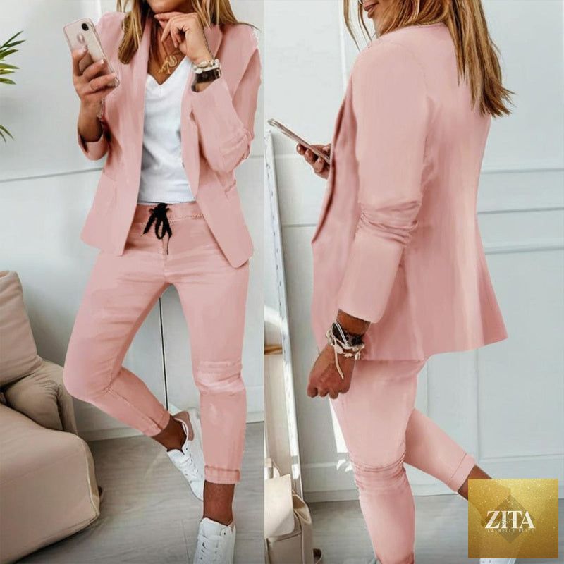 Women’s casual blazer and drawstring pants suit set by FitiqueFit, featuring notch-lapel blazer and matching relaxed-fit pants.