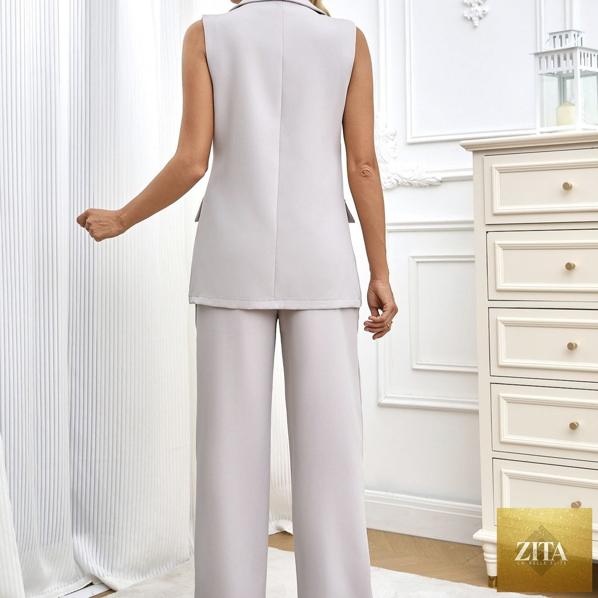 Women’s sleeveless wide-leg pants set by Zita La Belle Elite, featuring a solid color casual two-piece outfit with a relaxed fit.