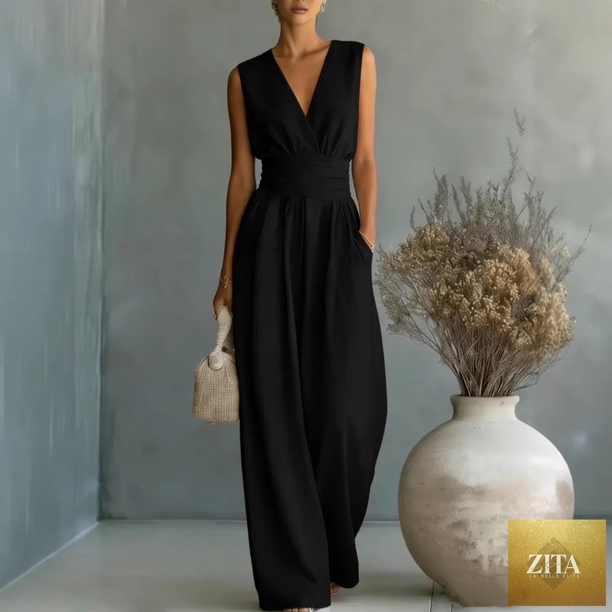 Women's elegant V-neck sleeveless jumpsuit by Zita La Belle Elite, featuring a waist-cinching fit and straight-leg casual style.