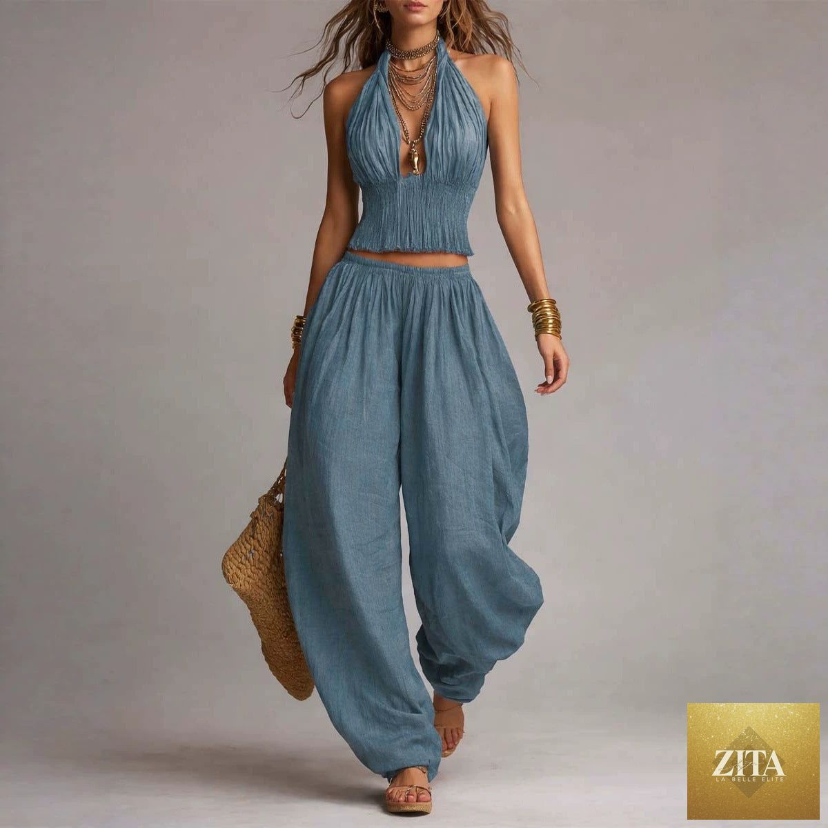 Zita La Belle Elite women's sleeveless backless halter top and wide-leg pants set displayed on a model.
