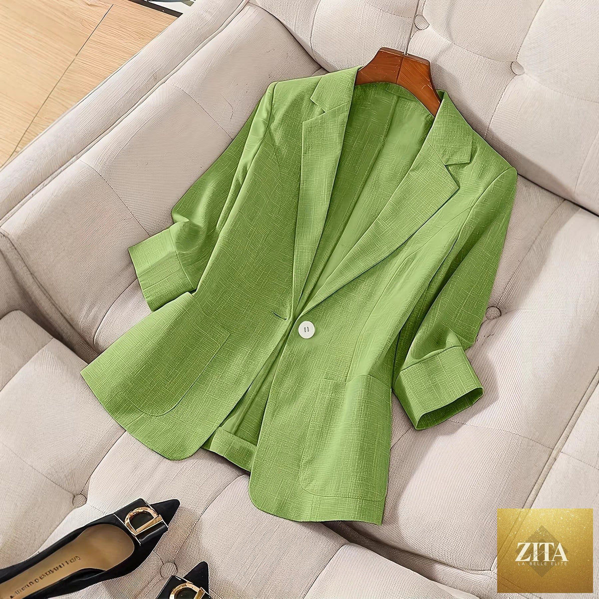 Women’s three-quarter sleeve casual blazer by Zita La Belle Elite, single-button design, tailored fit, neutral color, worn open or closed.