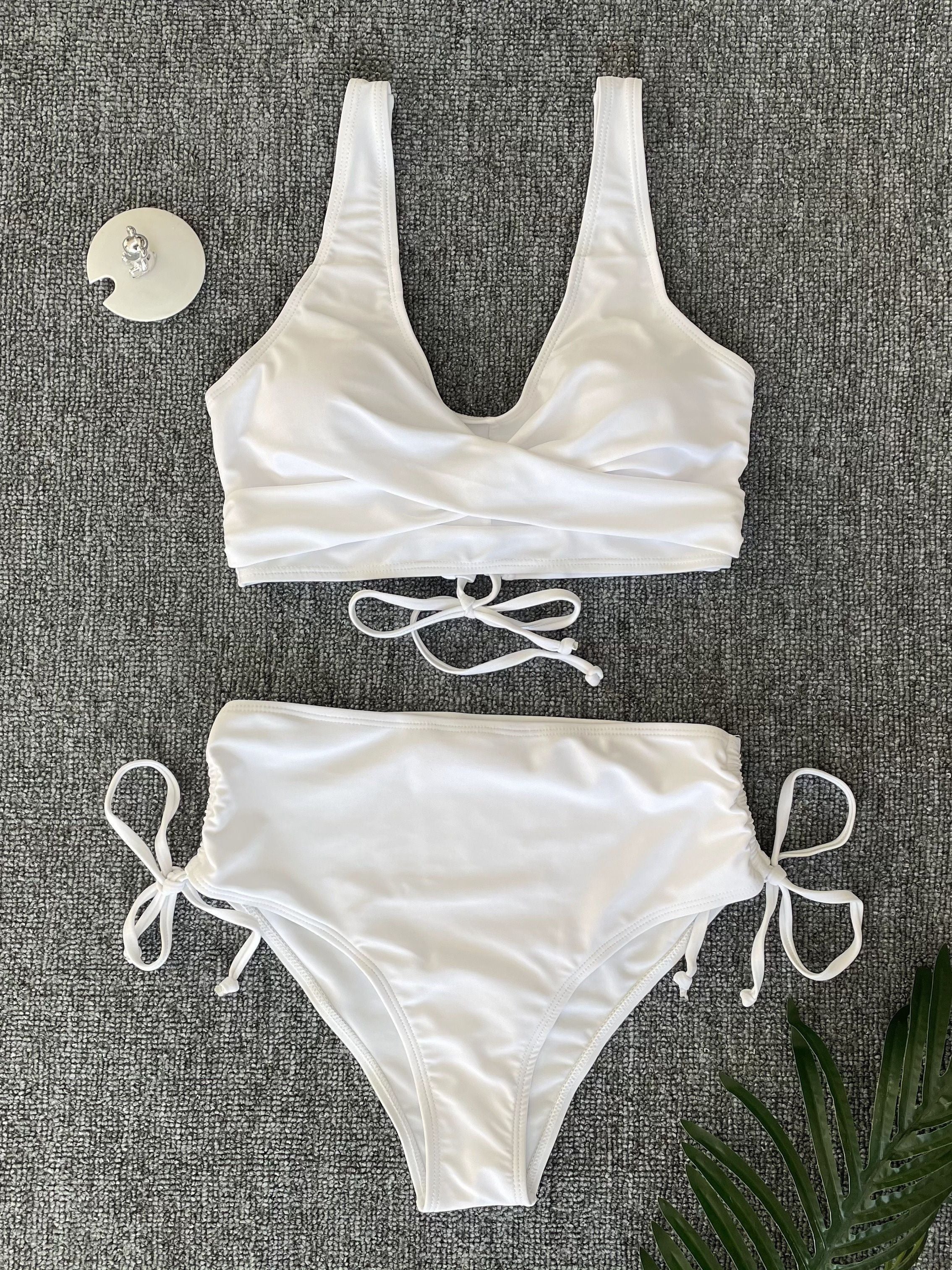 Stevvex women's bikini set with twist front V-neck top and high waist bottoms, in solid color, suitable for beach and pool days.