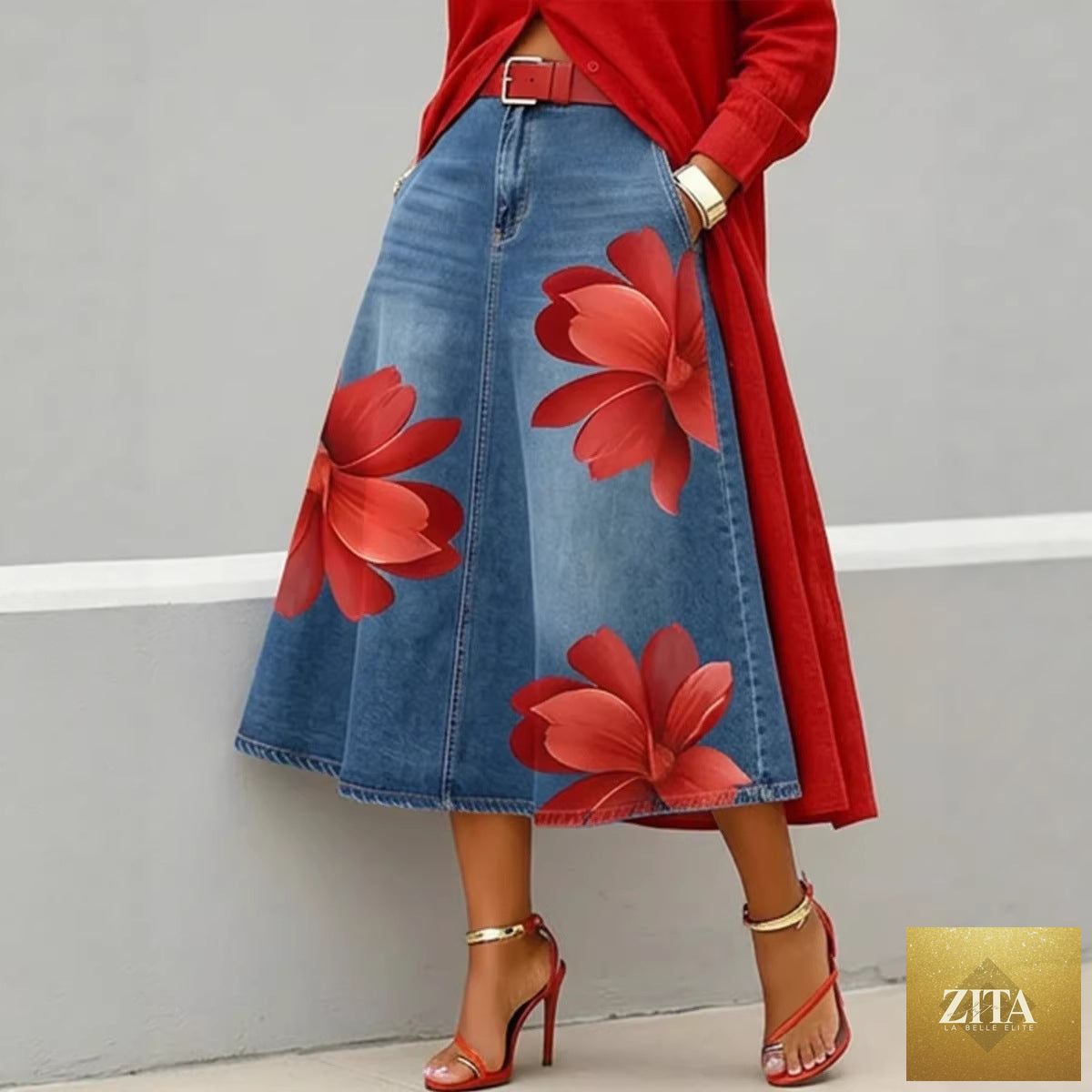 Women's floral print denim-style boho A-line midi skirt by FitiqueFit, featuring a flowing silhouette and colorful floral pattern.