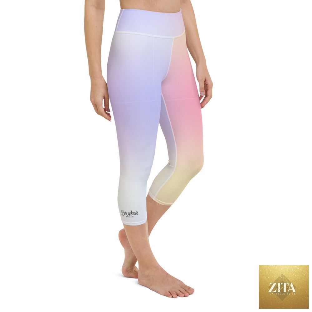 DARA SENDERS Parisian Sunset yoga capri leggings with an all-over sunset print, shown from the front in white.