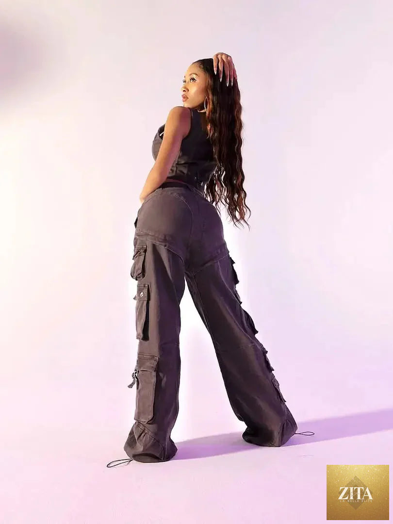 Low-rise twill cargo pants from Apple Bottom Jeans, featuring multiple pockets and a relaxed fit, shown in khaki color.